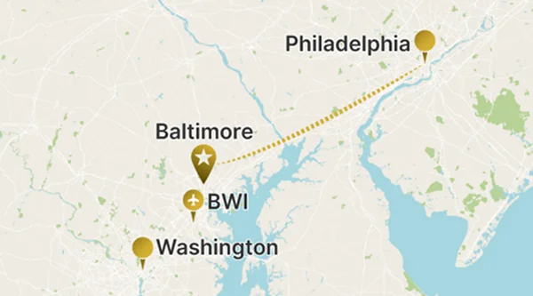 Map showing a long dotted route from Philadelphia leading southwest, across the head of the Chesapeake Bay, to Baltimore (star marker/BWI Airport).